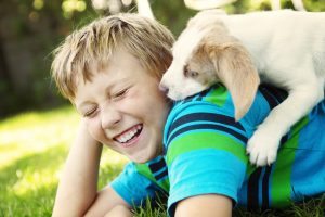child and pet dog